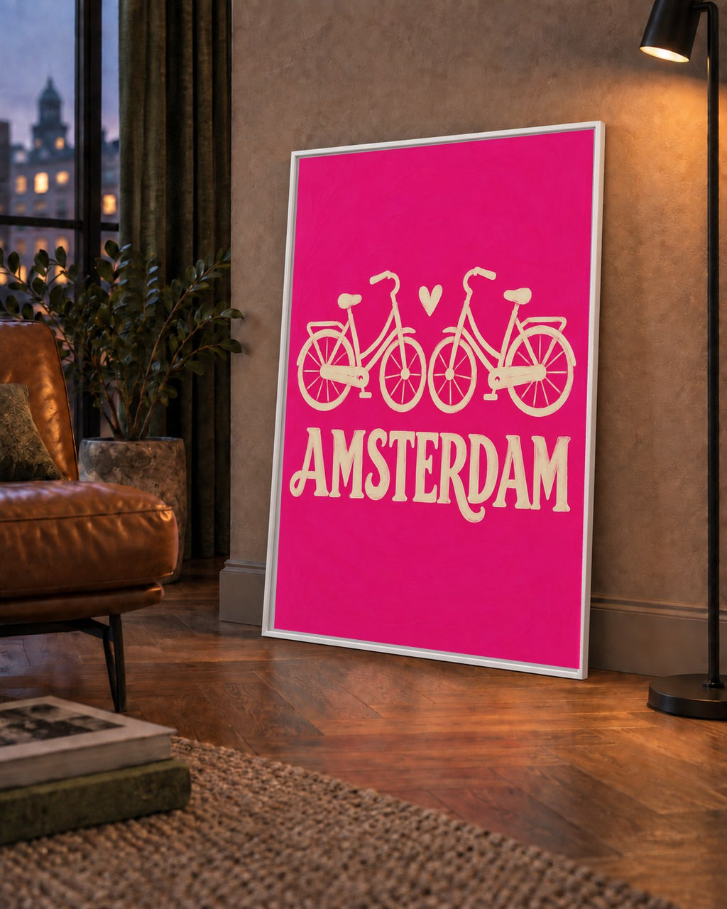Amsterdam Temalı Bisiklet İllüstrasyonlu Canlı Pembe Poster — çerçeveli hâliyle bir ev duvarında