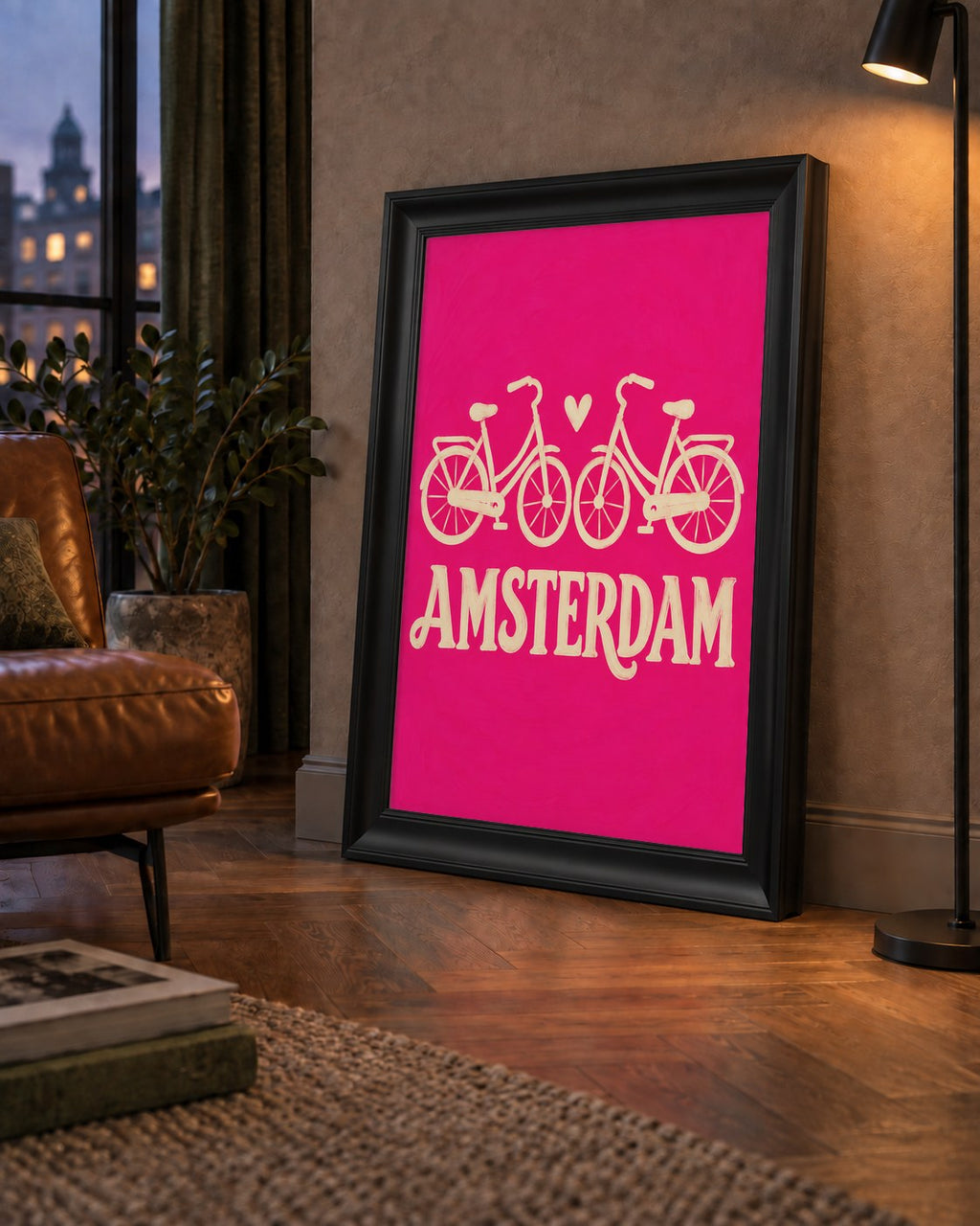 Amsterdam Temalı Bisiklet İllüstrasyonlu Canlı Pembe Poster — çerçeveli hâliyle bir ev duvarında