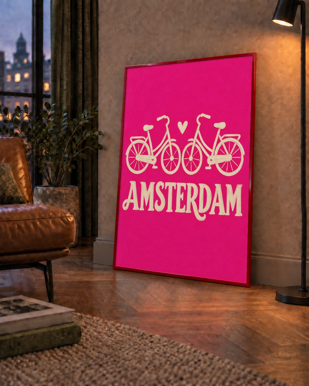 Amsterdam Temalı Bisiklet İllüstrasyonlu Canlı Pembe Poster — çerçeveli hâliyle bir ev duvarında