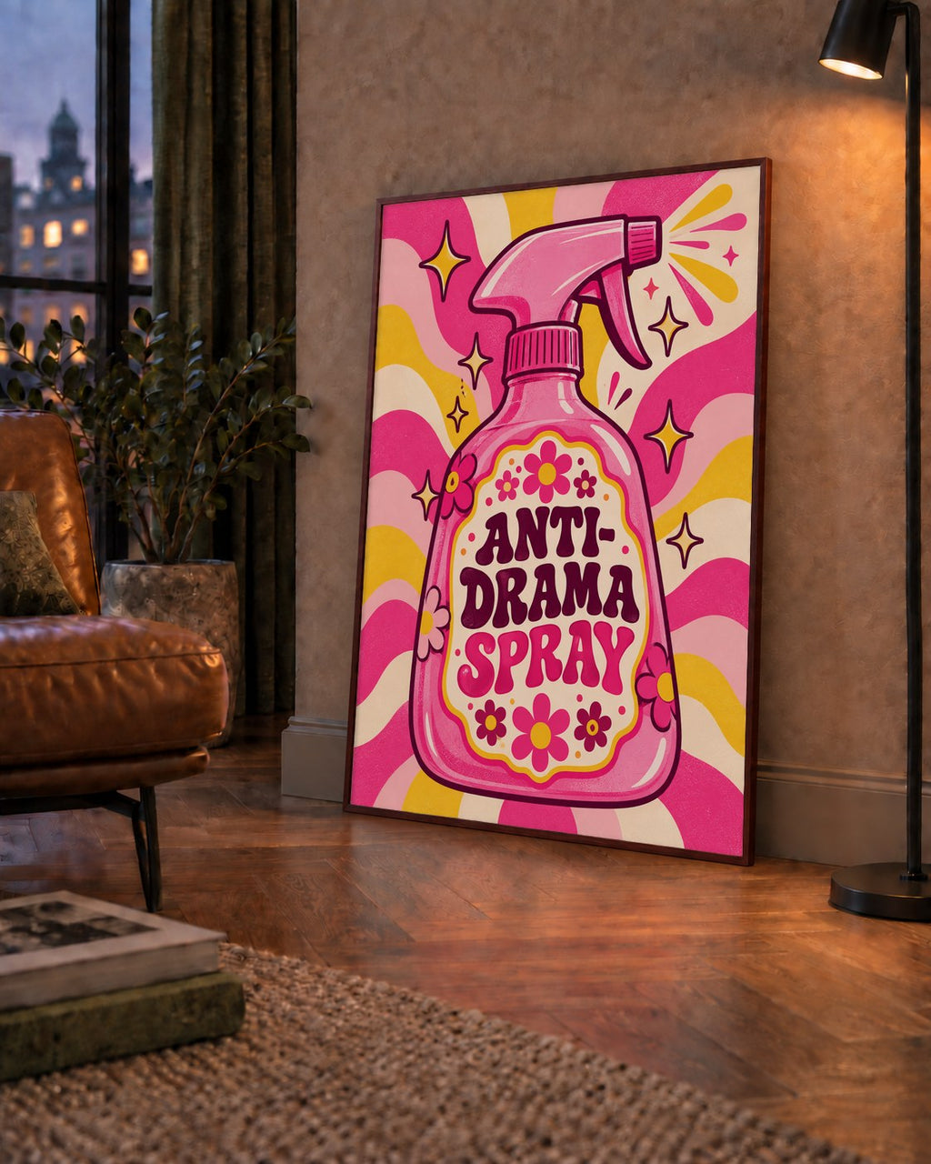 Anti-Drama Spray — çerçeveli hâliyle bir ev duvarında