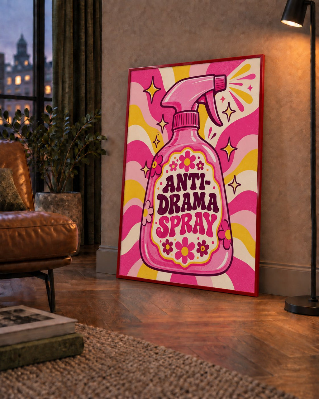 Anti-Drama Spray — çerçeveli hâliyle bir ev duvarında