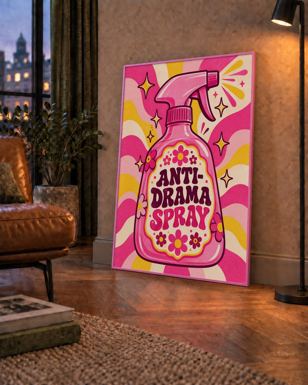 Anti-Drama Spray — çerçeveli hâliyle bir ev duvarında