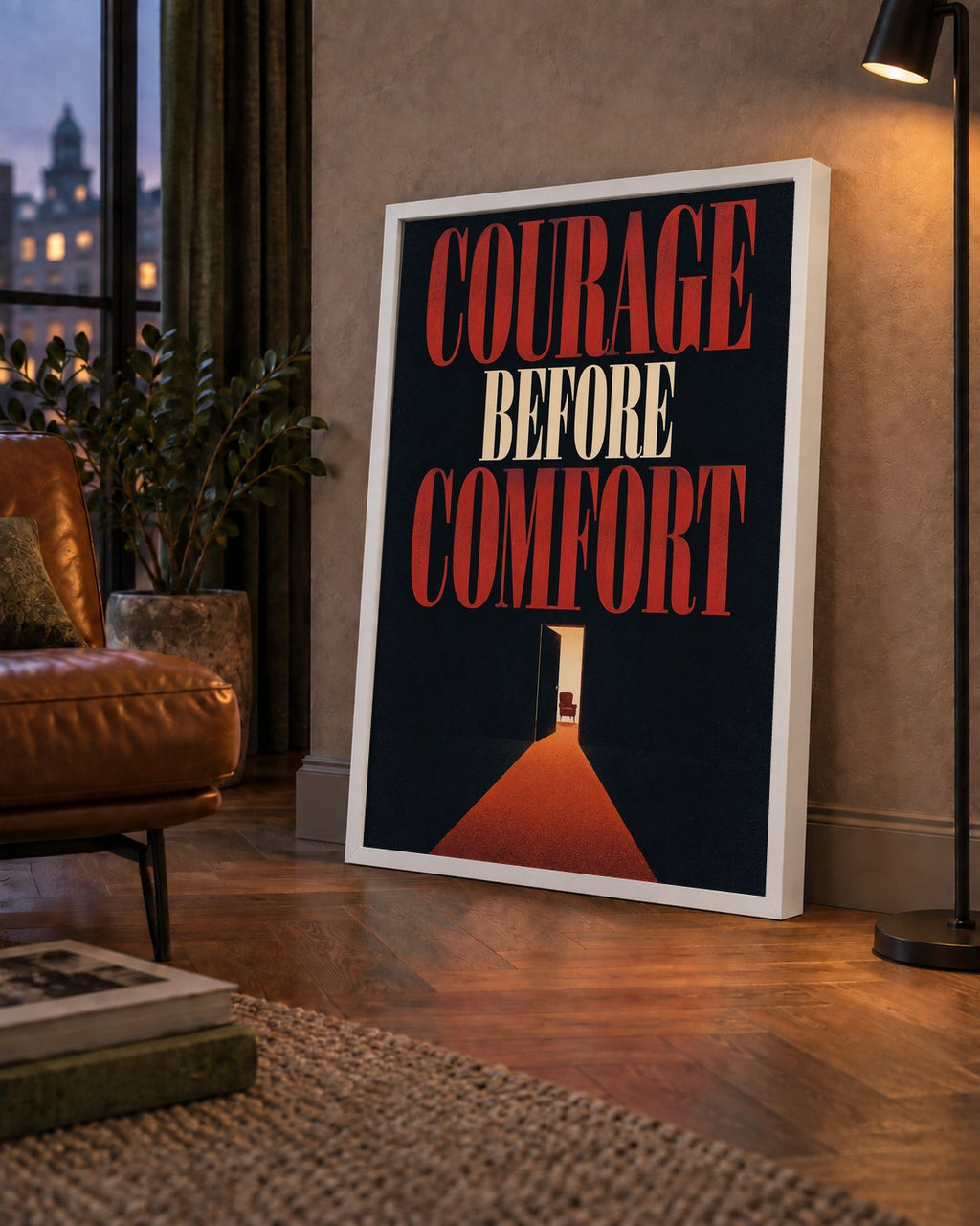 Courage Before Comfort - Cesaret ve Konfor Temalı Poster — çerçeveli hâliyle bir ev duvarında