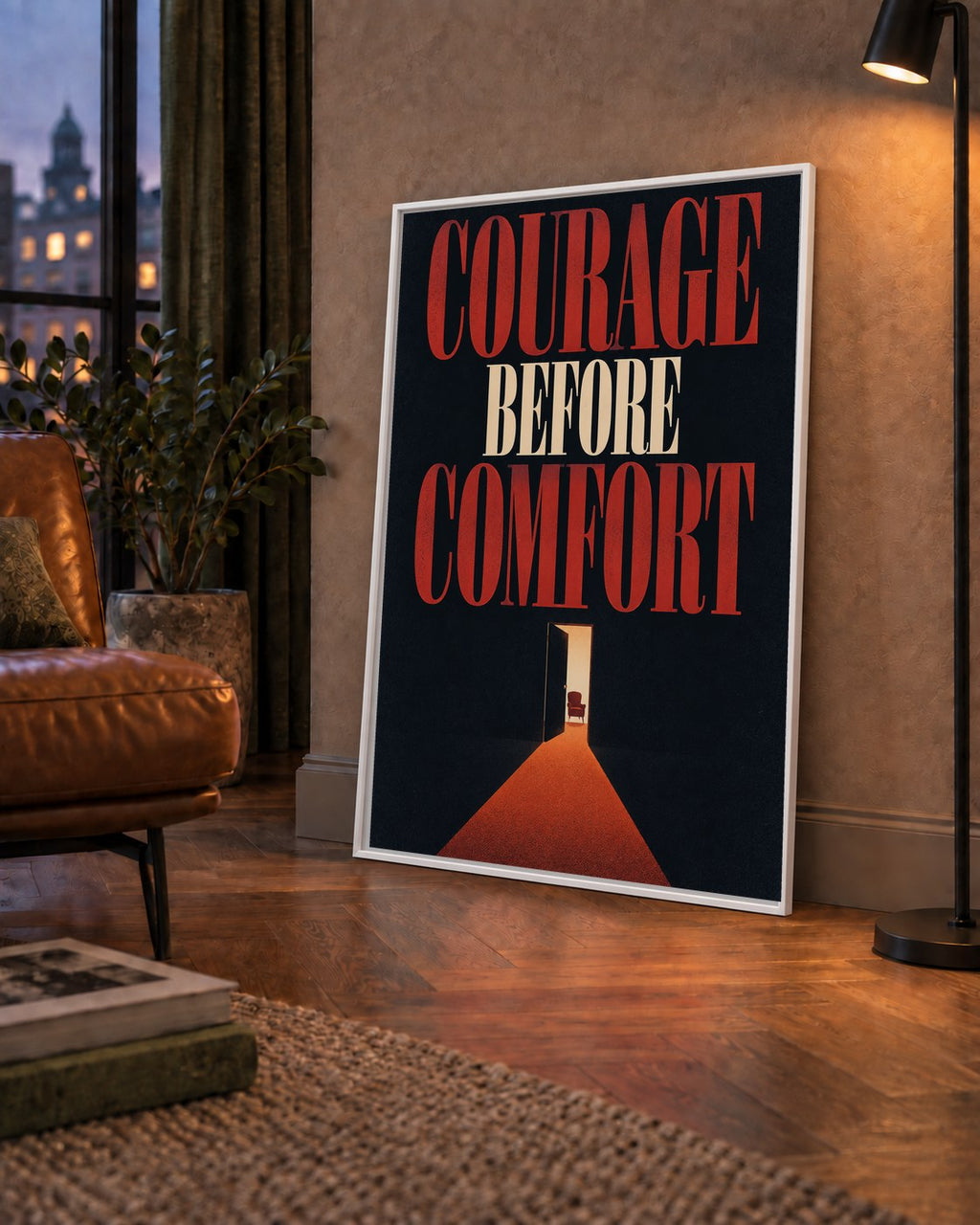 Courage Before Comfort - Cesaret ve Konfor Temalı Poster — çerçeveli hâliyle bir ev duvarında