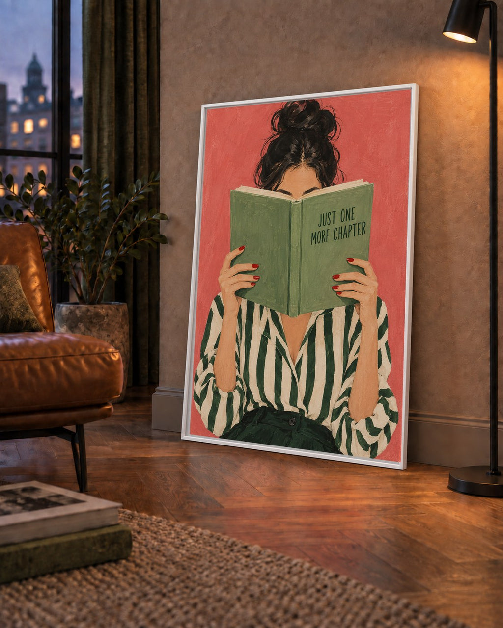 Kitap Okuyan Kadın İllüstrasyonlu Poster – Just One More Chapter — çerçeveli hâliyle bir ev duvarında