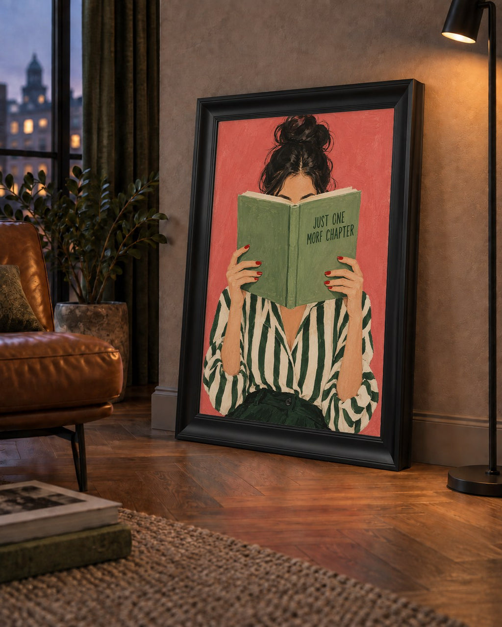 Kitap Okuyan Kadın İllüstrasyonlu Poster – Just One More Chapter — çerçeveli hâliyle bir ev duvarında
