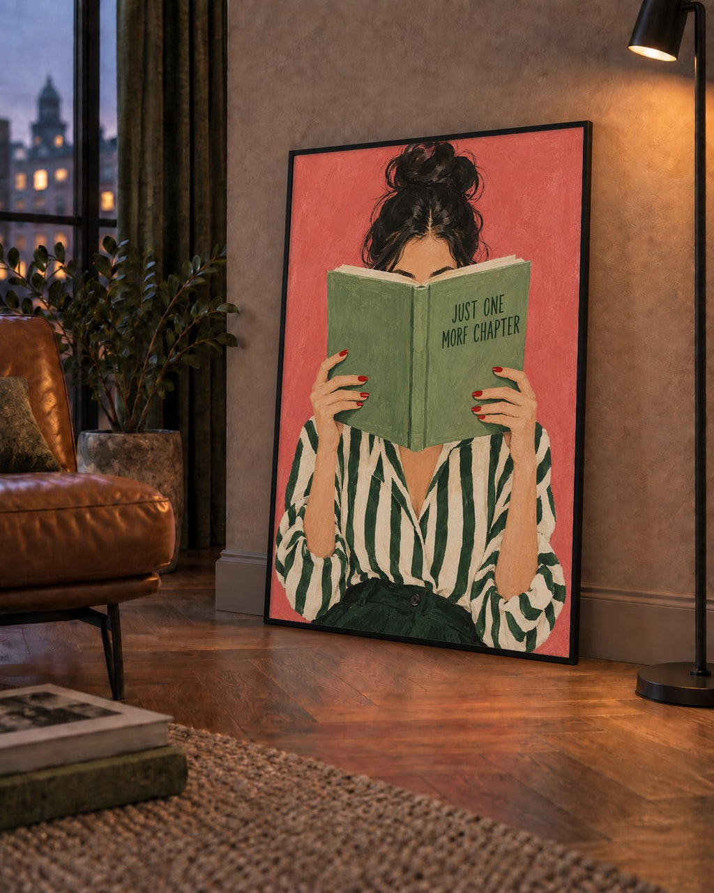 Kitap Okuyan Kadın İllüstrasyonlu Poster – Just One More Chapter — çerçeveli hâliyle bir ev duvarında