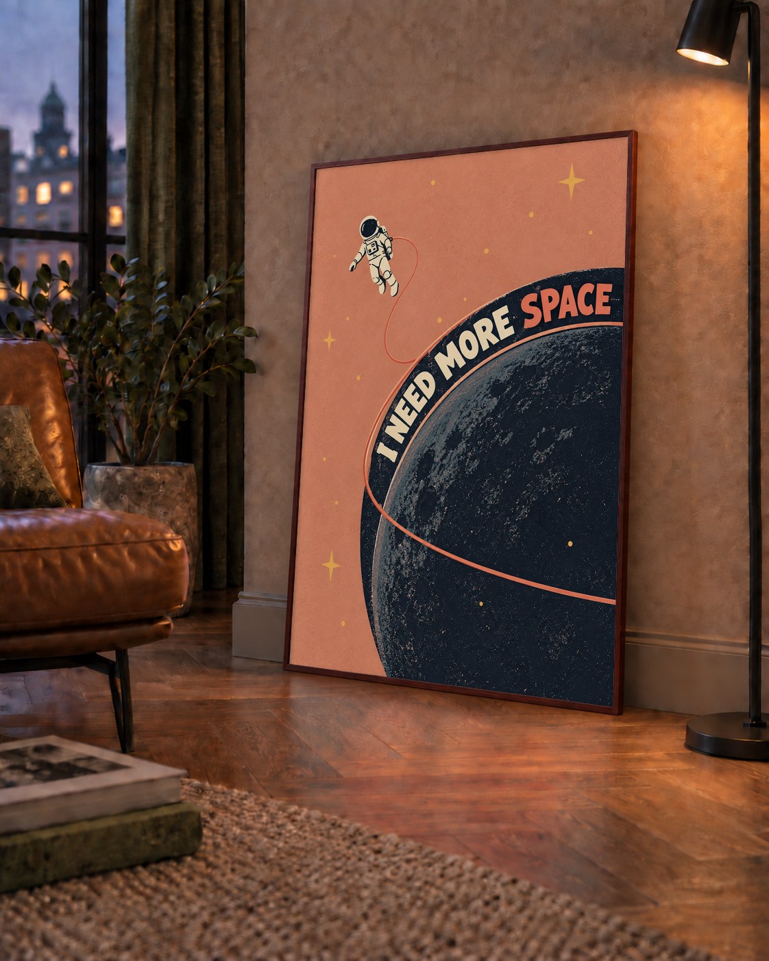 Retro Astronot Poster – Mizahi 'I NEED MORE SPACE' Tasarımı — çerçeveli hâliyle bir ev duvarında