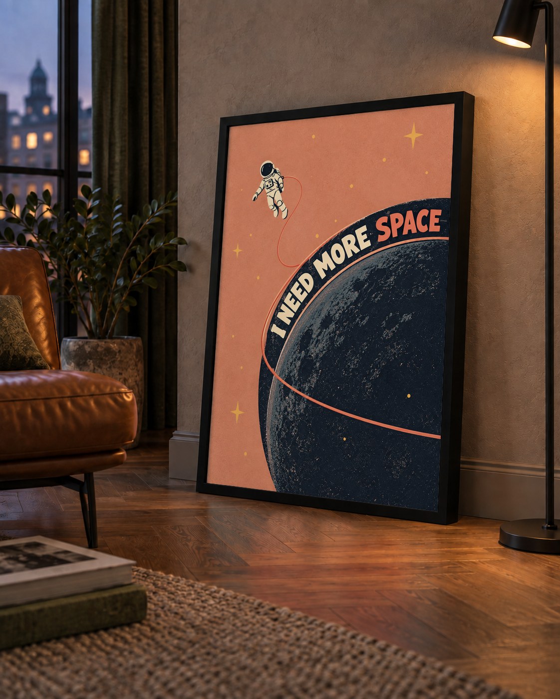 Retro Astronot Poster – Mizahi 'I NEED MORE SPACE' Tasarımı — çerçeveli hâliyle bir ev duvarında