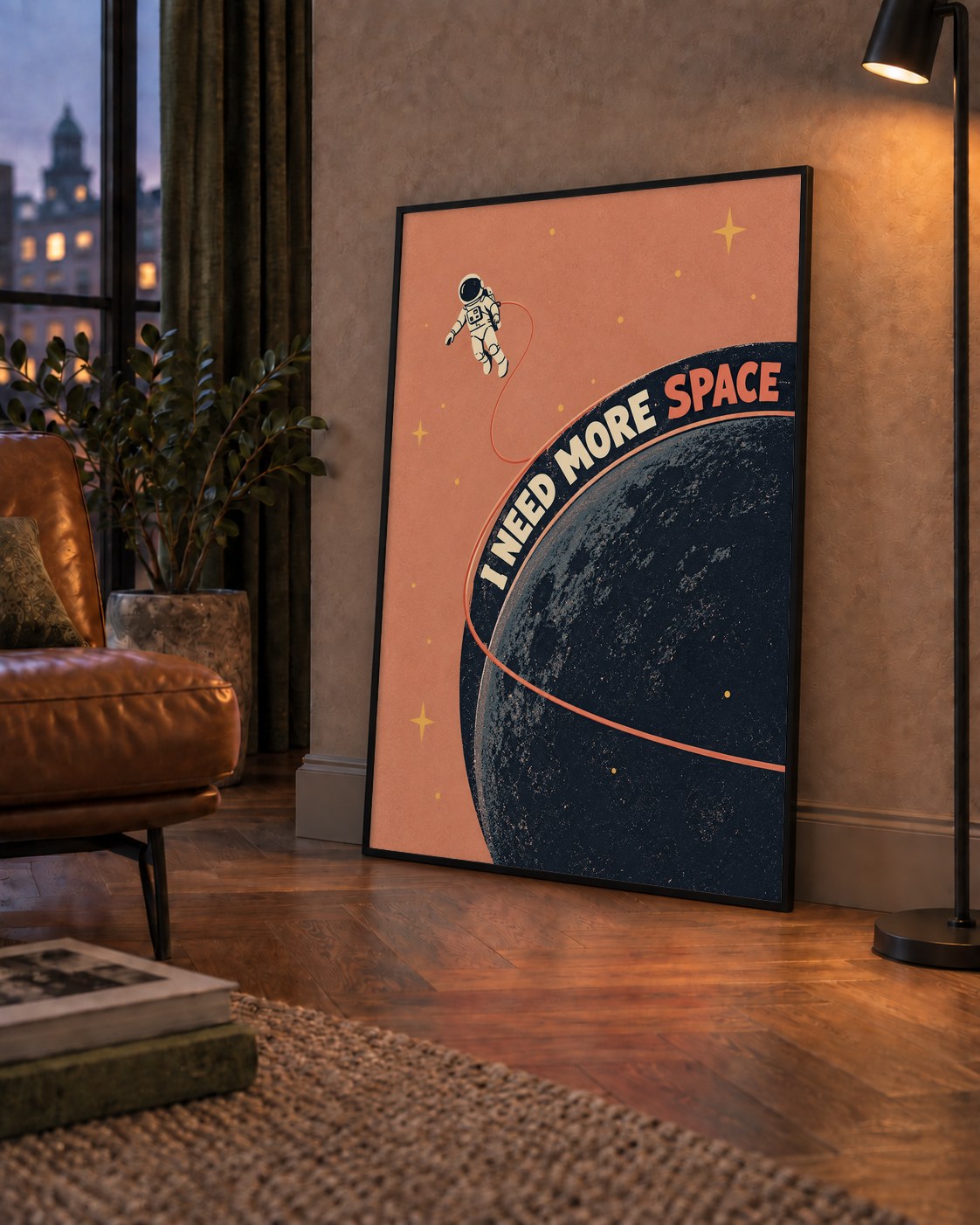Retro Astronot Poster – Mizahi 'I NEED MORE SPACE' Tasarımı — çerçeveli hâliyle bir ev duvarında