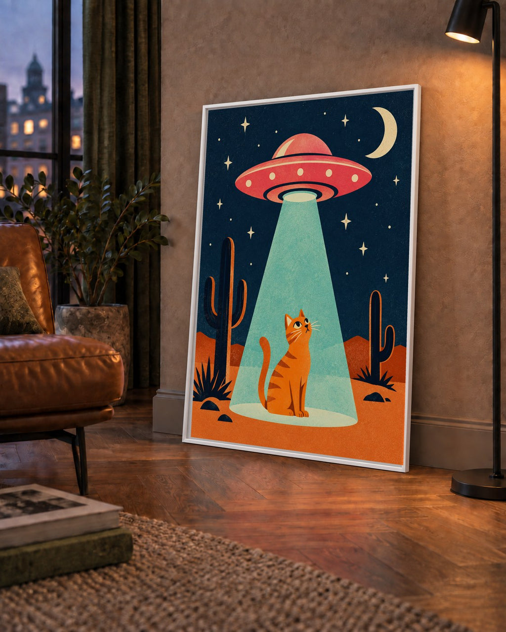 Çöl Manzaralı Uzay Gemisi ve Kedi Poster – Retro Vektör Tasarım — çerçeveli hâliyle bir ev duvarında