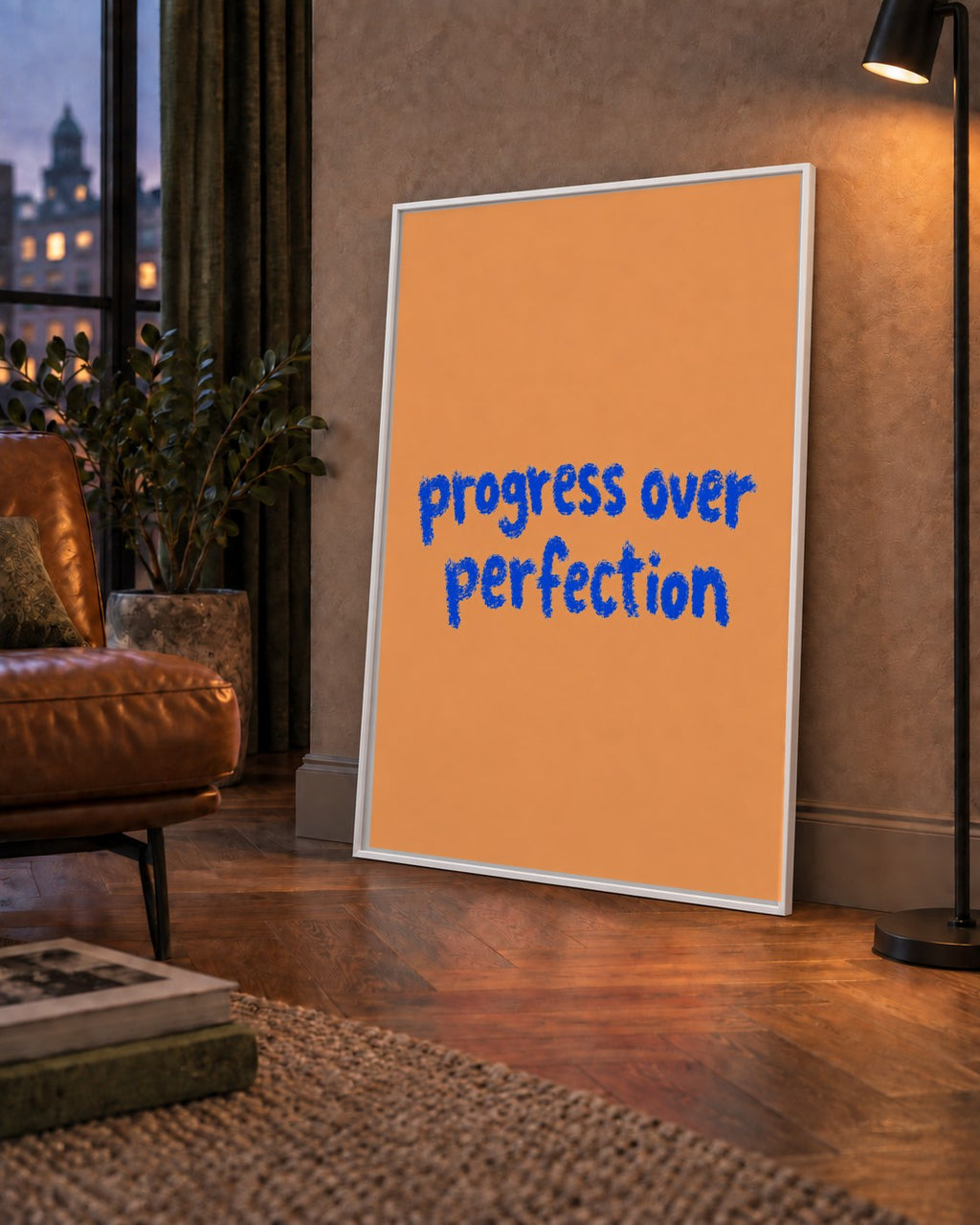 Progress Over Perfection Minimal Turuncu Poster — çerçeveli hâliyle bir ev duvarında