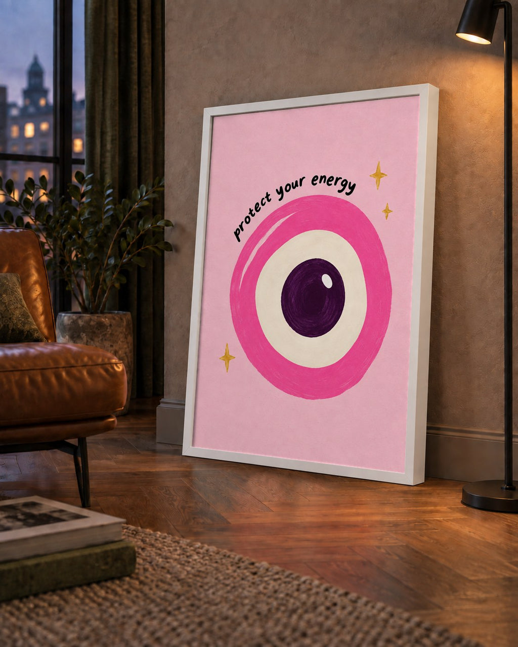 Protect Your Energy Pembe Nazar Poster — çerçeveli hâliyle bir ev duvarında