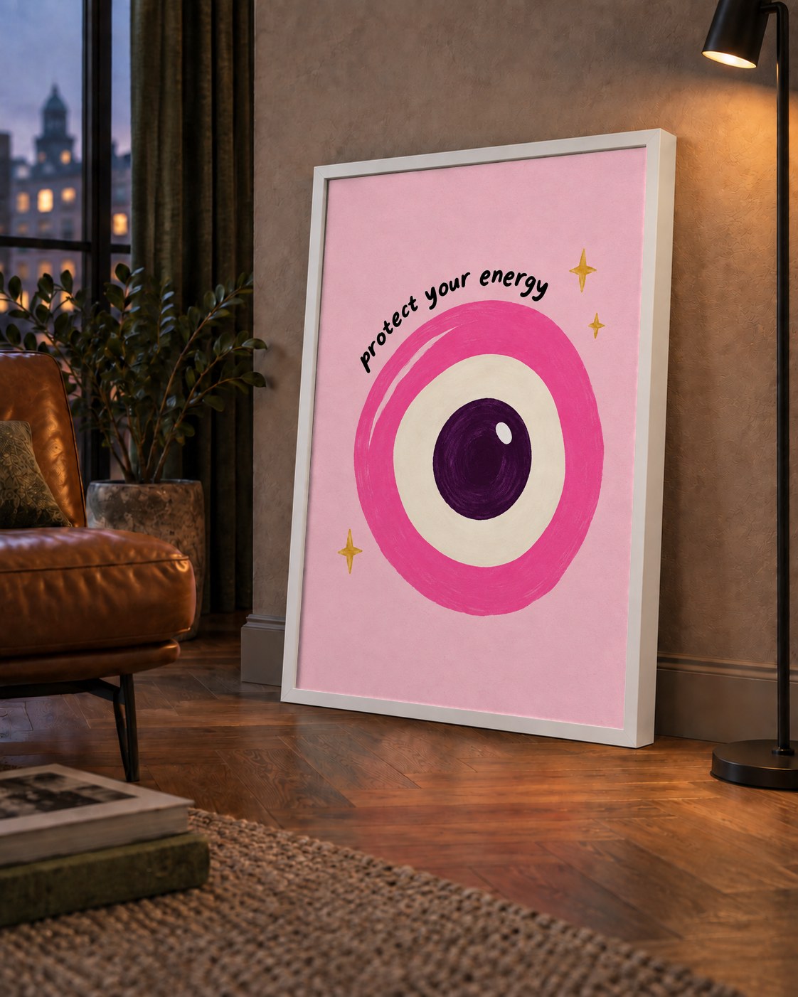 Protect Your Energy Pembe Nazar Poster — çerçeveli hâliyle bir ev duvarında
