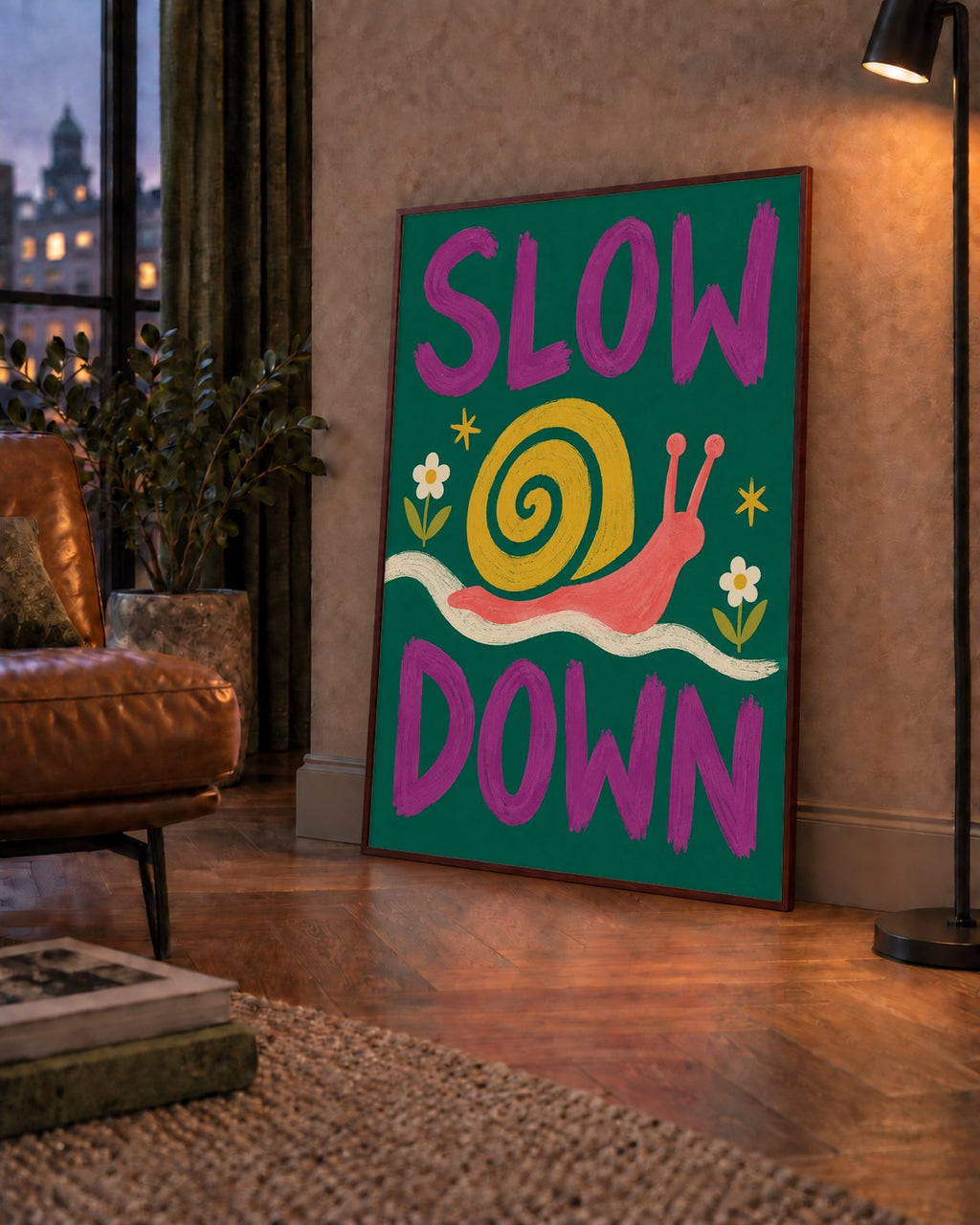Slow Down Poster – Pastel Salyangoz ve Çiçekler Duvar Sanatı — çerçeveli hâliyle bir ev duvarında