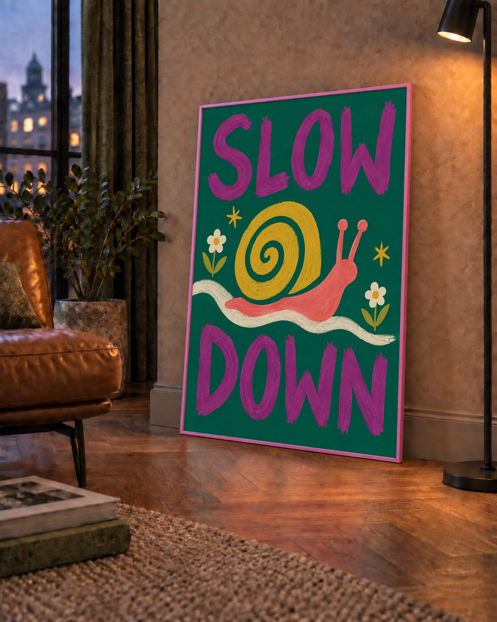 Slow Down Poster – Pastel Salyangoz ve Çiçekler Duvar Sanatı — çerçeveli hâliyle bir ev duvarında