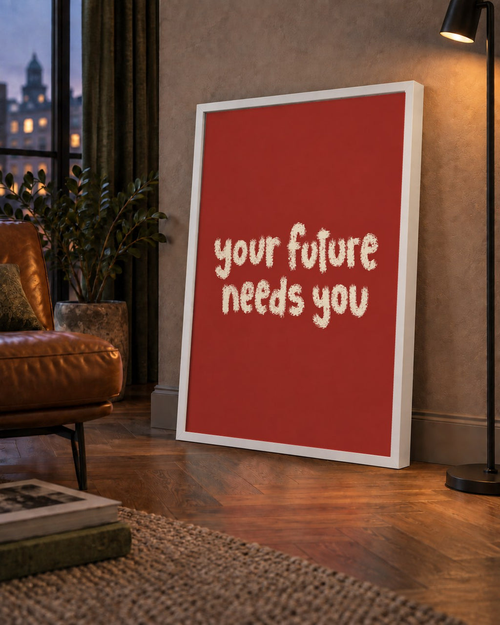 Your Future Needs You – Kırmızı Minimal İlham Veren Poster — çerçeveli hâliyle bir ev duvarında